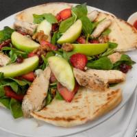 Strawberry Spinach Salad · Fresh organic baby spinach, blue cheese, apples, cranberries, toasted walnuts, fresh strawbe...