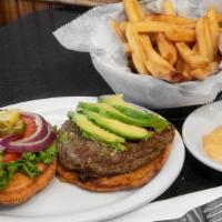 Homemade Turkey Burger · Top grade turkey burger served on a toasted bun with romaine lettuce, tomato, red onion, cho...