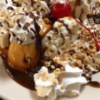 Sander'S Hot Fudge Cream Puff · Guernsey's Vanilla ice cream, Sander's hot fudge, homemade cream puff, nuts, whipped cream a...
