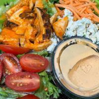 Buffalo Chicken · Organic mixed greens, all-natural chicken tossed in a Buffalo sauce, fresh celery, shredded ...