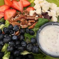 Summer Berry · Organic mixed greens, fresh strawberries, blueberries, pecans and rich Feta cheese crumbles....