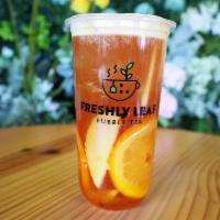 Jungle Fruit Tea · White Peach Oolong Tea with infused Passion Fruit and Pineapple (Apple and Orange Slices Top...