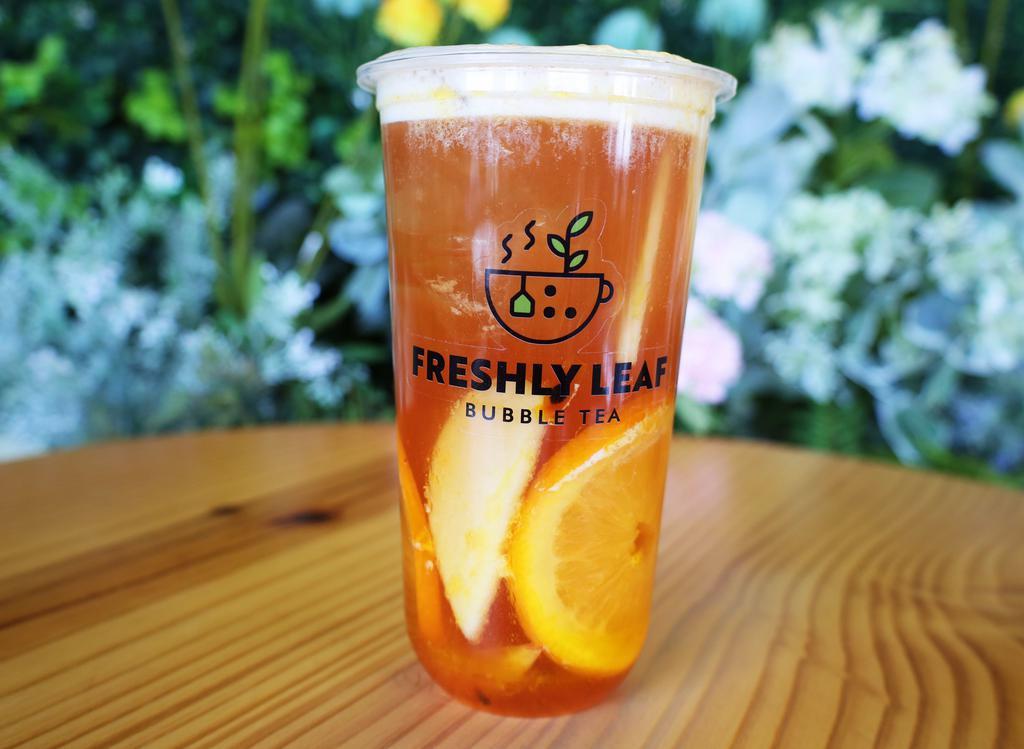 Jungle Fruit Tea · White Peach Oolong Tea with infused Passion Fruit and Pineapple (Apple and Orange Slices Toppings).