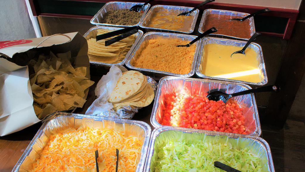 Taco Fiesta 5 (Serves 5 People) · All party packs include fresh salsa, cheese sauce,
chips, homemade flour tortillas, rice, and your
choice of refried, steamed pinto, or black beans.