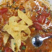 Handmade Tortilla Soup · Made from scratch a savory broth perfectly seasoned with minced garlic, cilantro and our sec...