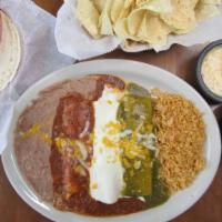 Mexican Flag Enchilada Sampler · A trio of enchiladas, showcasing the colors of the Mexican flag cheese with chili con carne,...