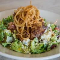 Black & Bleu Steak Salad · Blackened filet tips on a bed of fresh greens with bleu cheese dressing, grape tomatoes, har...