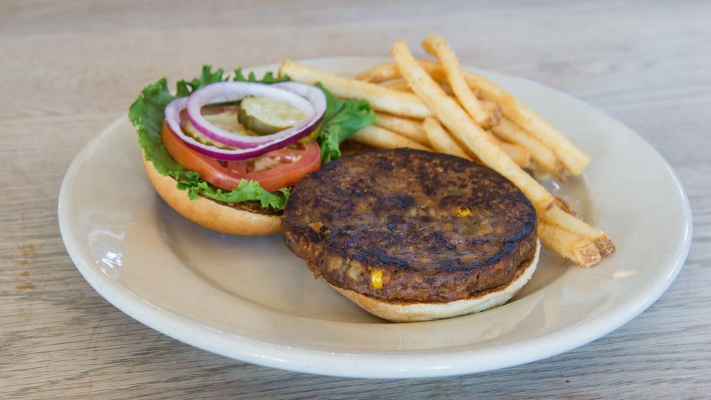 Gardenburger · Vegan burger served with leaf lettuce, tomato, red onion, and pickles on a brioche bun.