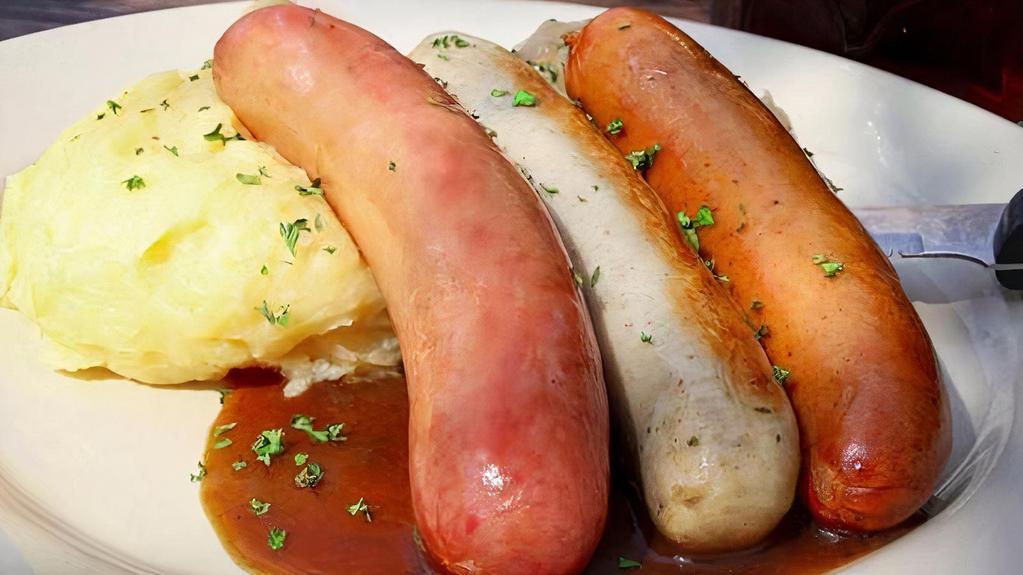 Wurstplatte · Grilled Bierwurst, Bratwurst, and Mettwurst: Our sampler of wursts served with mashed potatoes and imported sauerkraut.