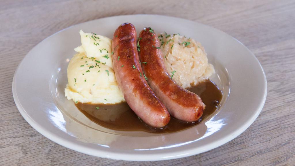 Bierwurst Dinner · Two grilled bierwursts: beef and pork sausages served with mashed potatoes and imported sauerkraut.
