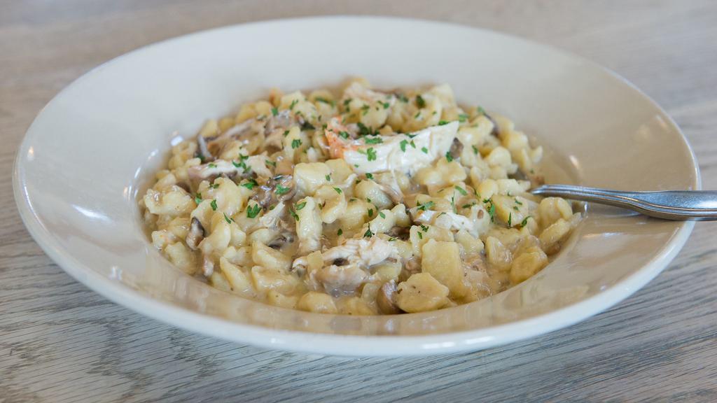 Heidelberger Rahm Spaetzle · Pulled roasted chicken and spaetzle sautéed with onions and sliced mushrooms tossed in a marsala cream sauce.