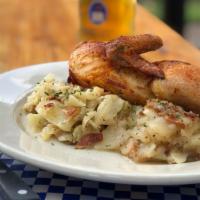 Grillhendl · Oktoberfest style roasted half Chicken. Served crispy brown with German Potato Salad and Fri...
