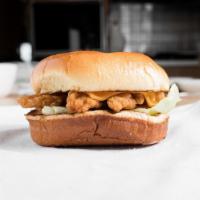 Chicken Tenders Sandwich · served on a bun with lettuce, tomato, mayo, and American cheese.