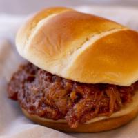Bbq Pulled Pork · Slow simmered pulled pork covered in a slightly sweet barbeque sauce.