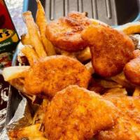 Kids Chicken Nuggets Meal · Kids Meals come with a HALF portion of fresh cut fries and a drink choice of Juice Box or Wa...