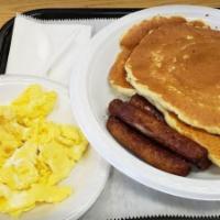 Pancake Breakfast · Two eggs (any style) with ham or five strips of bacon or five sausage links.