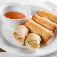Veggie Egg Rolls (4 Pieces) · Homemade fresh daily, crispy chicken and veggie egg rolls. Served with sweet and sour sauce.