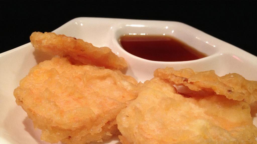 Sweet Potato Tempura · Deep fried and served with tempura sauce.
