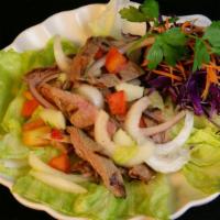Beef Salad · Hot and spicy. Grilled steak slices in spicy lime dressing with cucumbers, tomatoes, and oni...