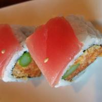 Red Dragon Roll · Hot and spicy. Crabmeat, cucumber, and avocado topped with tuna, avocado, and special sauce.