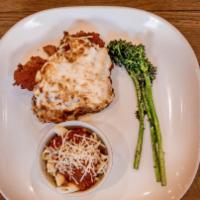 Beef, Chicken Or Veal Parmesan · hand-breaded and topped with marinara and melted mozzarella. Served with pasta, our vegetabl...