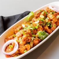 Chicken 65 · Boneless chicken marinated with rich Indian spices and deep-fried.