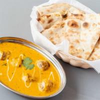 Paneer Tikka Masala · Cottage cheese cooked in cream and tomato gravy with a combination of onion, peppers, and to...