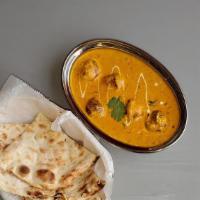 Malai Kofta · Potato dumplings made with veggies, cheese, and cashew nuts cooked in delicious creamy gravy.