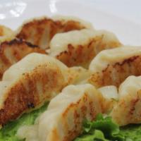 Pork Pot Stickers · Cooked to your preference of steamed or deep fried.