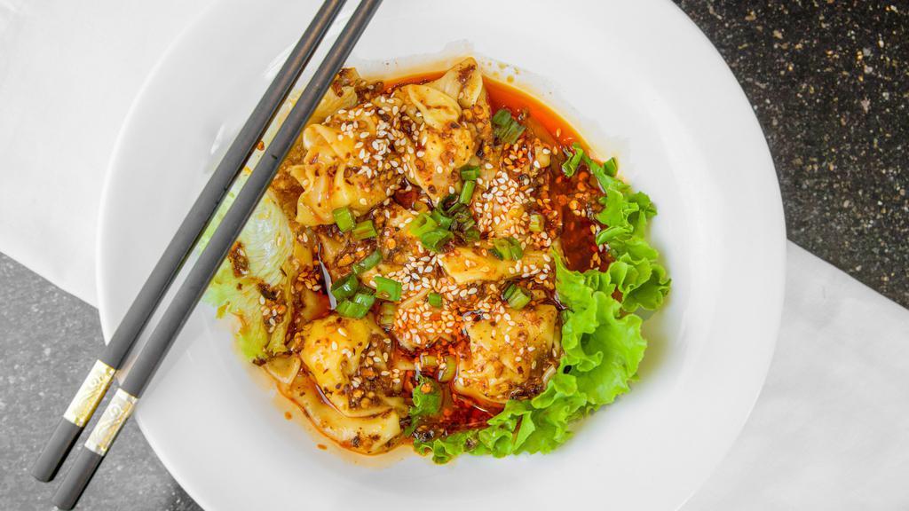Spicy Sichuan Shrimp Wontons · Homemade shrimp paste wontons in our signature spicy Sichuan sauce.