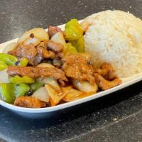 Pepper Beef · Stir-fry beef with carrots, onion, and green bell pepper in savory brown sauce.