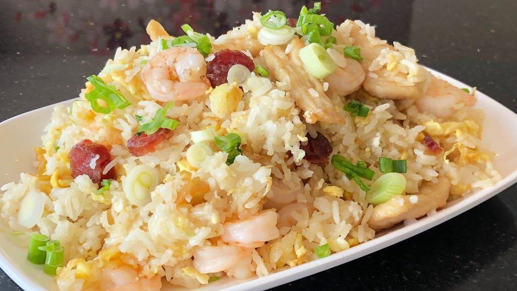 Yang Chow Fried Rice · Chinese sausage, chicken, shrimp, egg, scallion.