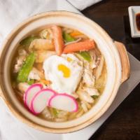 Nabe Yaki Udon · Noodle soup w. chicken, vegetable, seafood, egg, shrimp tempura.