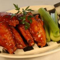 Tamarind Glazed Chicken Wings · One pound, celery sticks, and blue cheese.