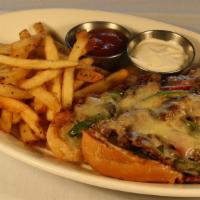 Gluten Free Philly Cheese Steak · Shaved prime rib, melted white cheddar cheese, sautéed mushrooms, onions, and peppers.