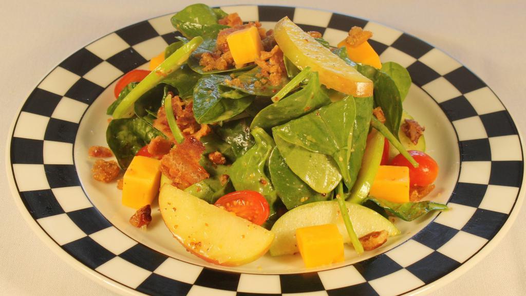 Gluten Free Two Apple Spinach Salad · Crisp bacon, cheddar cheese, candied pecans, red onion, grape tomatoes, and sherry mustard vinaigrette.