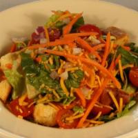 Gluten Free Mixed Greens · With grape tomatoes, carrots, red onion, and cheddar cheese tossed in our house vinaigrette ...