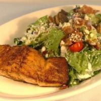 Black & Blue Salmon Salad · Blackened salmon, mixed greens tossed with blue cheese dressing, grape tomatoes, bacon, red ...