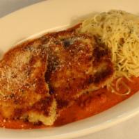 Romano Crusted Chicken · Crispy fried chicken, garlic buttered noodles, and roasted tomato cream sauce.