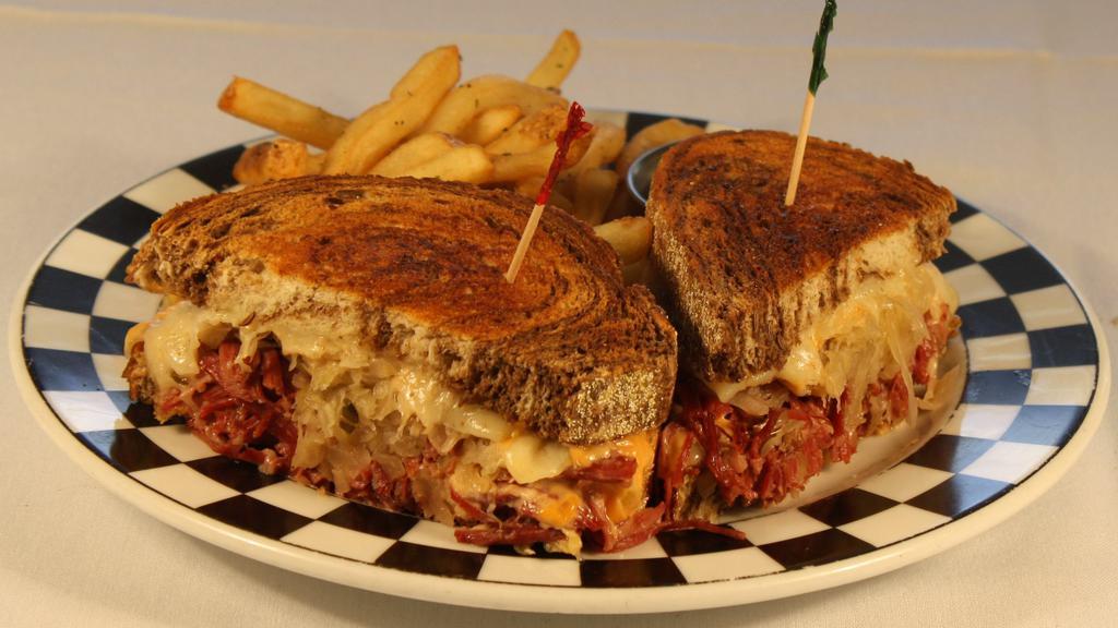 Jake’S Famous Reuben · House-made pulled corned beef, Swiss cheese, sauerkraut, and 1000 island on marble rye.