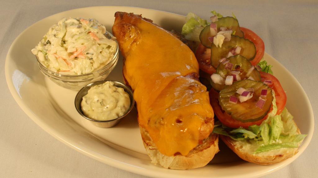 Fried Fish Sandwich · Beer battered fish, cheddar, pickle, and LTO with a side of sweet pickle tartar.