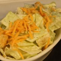 Kid'S Salad · Iceberg lettuce, cheddar cheese with cilantro ranch dressing. (Dressing is served on the sid...