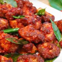 Chicken 65 · Chicken 65 is a spicy, deep-fried chicken dish originating from south India