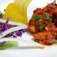 Manchurian Style · Choose from Chicken, Cauliflower, Paneer, or Vegetarian ballls stir fried with sweet and spi...
