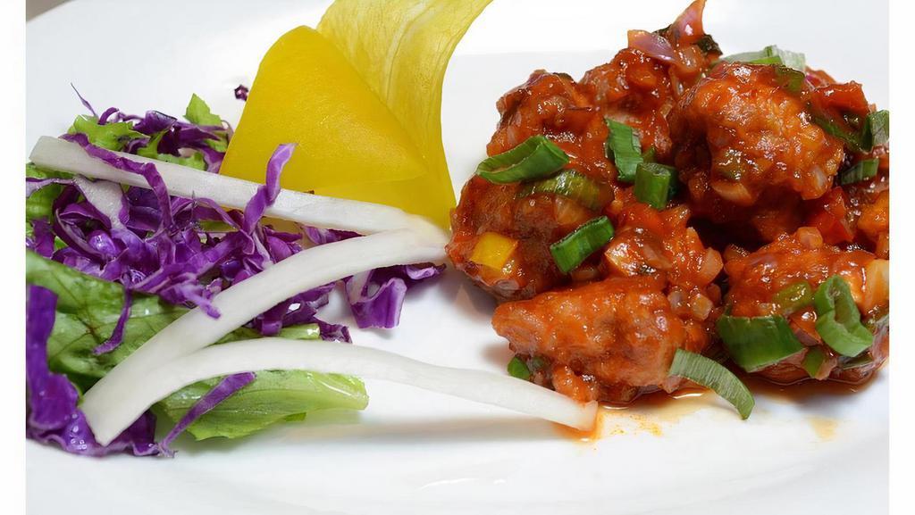 Manchurian Style · Choose from Chicken, Cauliflower, Paneer, or Vegetarian ballls stir fried with sweet and spicy savory Chinese spices.