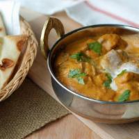 Butter Masala · Choose from Chicken or Paneer cooked with butter in milder spices to perfection