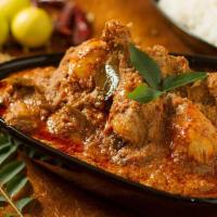 Chicken Chettinad · Boneless chicken cooked in the popular south Indian style with a unique mix of spices