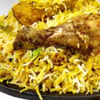 Dum Biryani · Chicken or Goat options for Layers for Basmati rice, meat with spices air-cooked (DUM) and w...