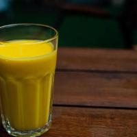 Mango Lassi · A yogurt based mango milkshake smoothie
