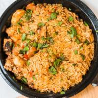 Jambalaya · Rice, onions, bell peppers, spices, chicken sausage, chicken, shrimp, cilantro.